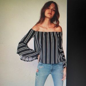 Stripped off the shoulder bell sleeve top